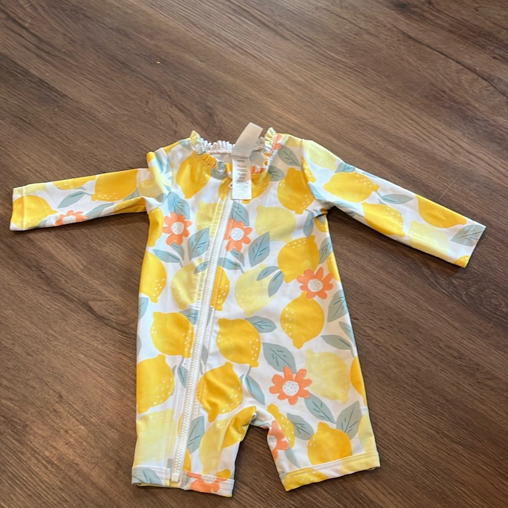 6 month Carter’s lemon swimsuit